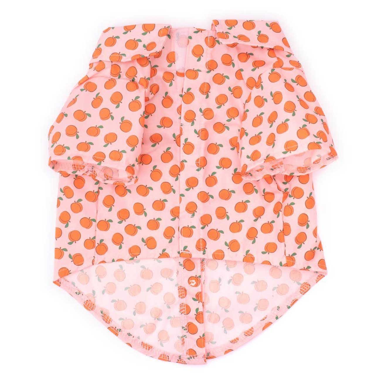 Pink baby bloomers with orange peach pattern on a white background