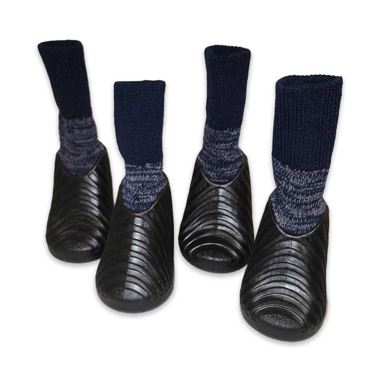 Black slip-on dog shoes with blue patterned socks on a white background