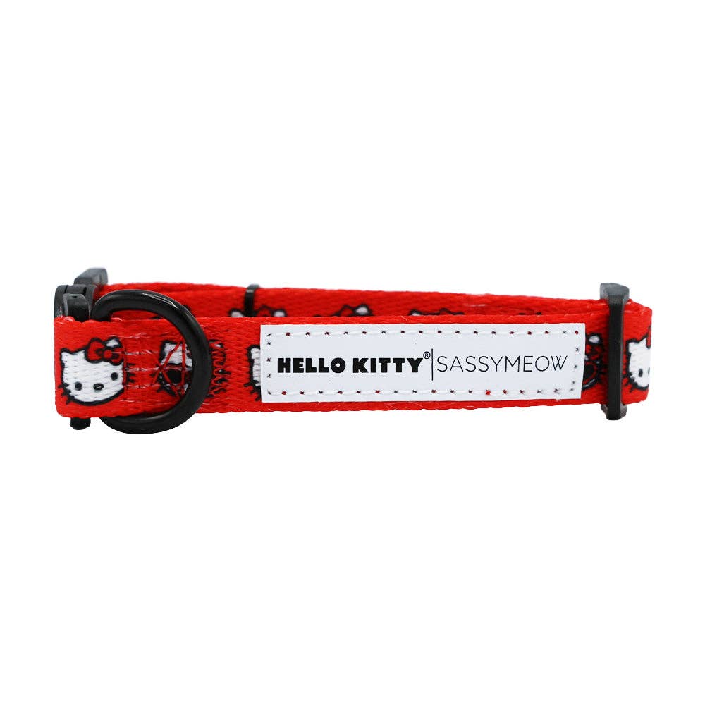 Red dog collar with Hello Kitty design and 'SASSYMEOW' text on a white background