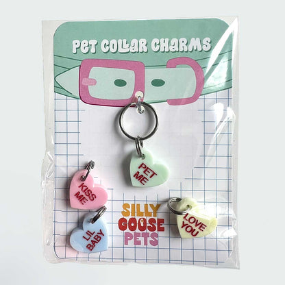 Pet collar charms in packaging with 'Silly Goose Pets' branding