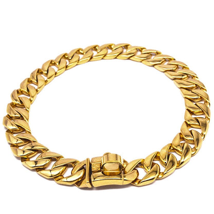 Gold chain bracelet on a white background
