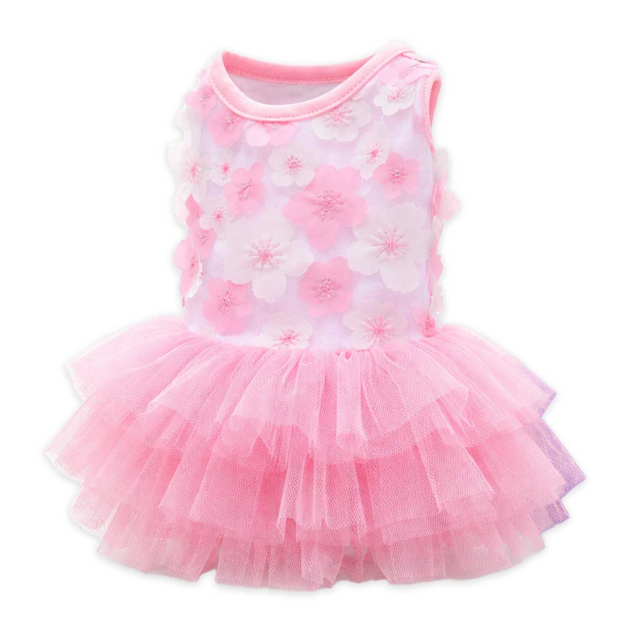 Pink dog's dress with floral pattern on a white background