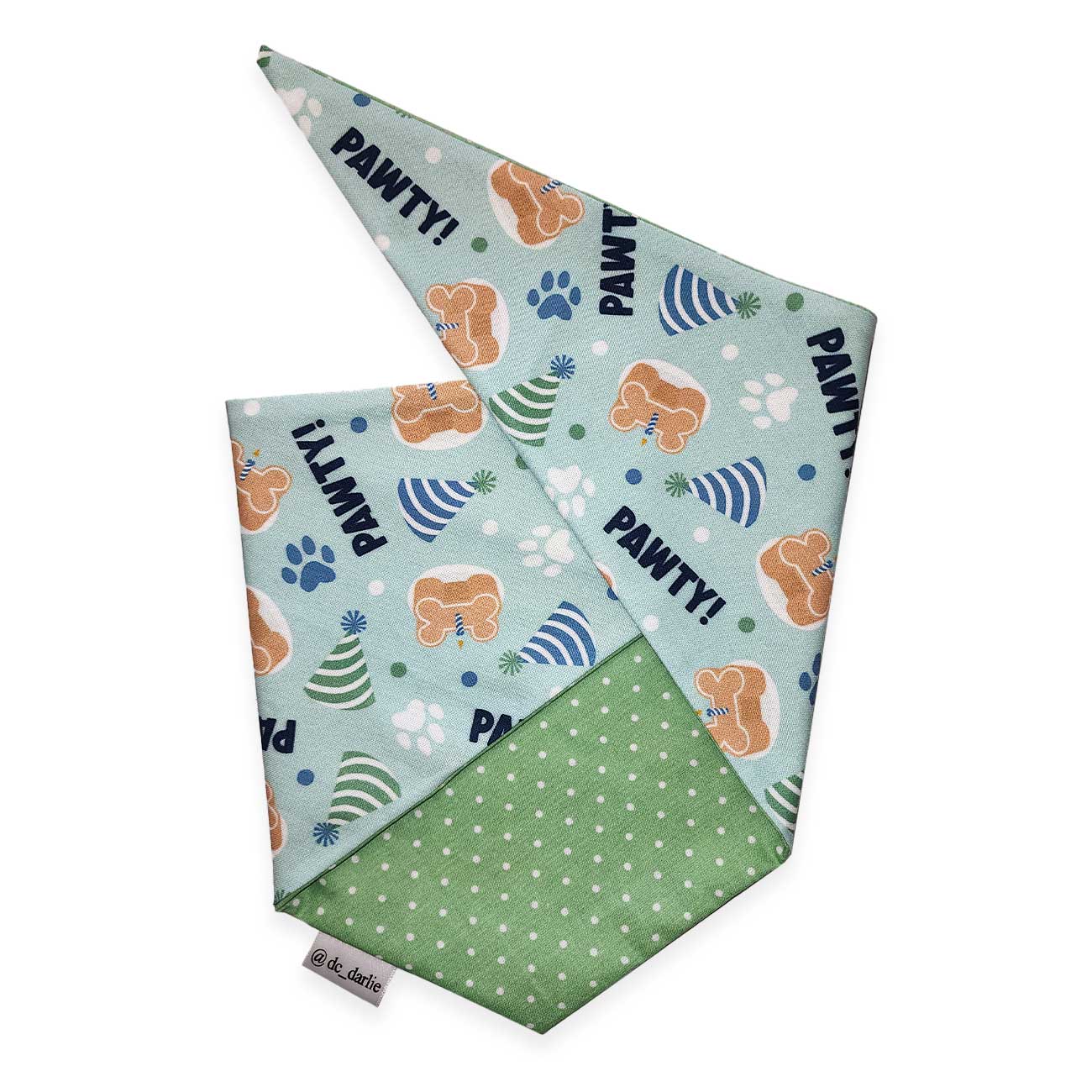 Dog bandana with paw prints and 'PAWTY!' text on a white background