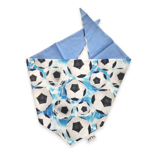 Dog bandana with soccer ball pattern on a white background