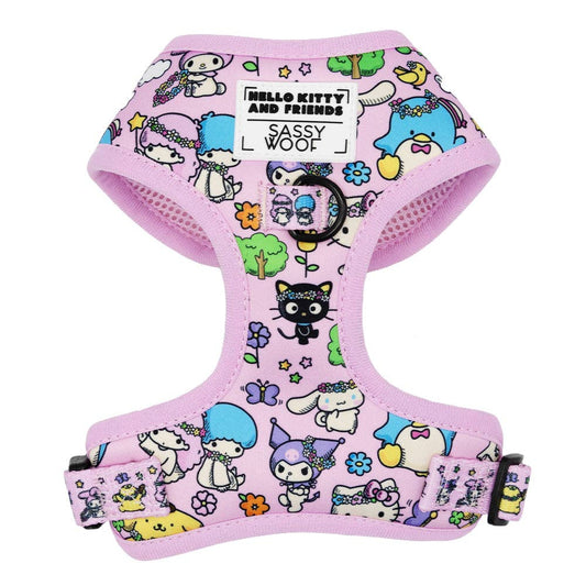 Pink dog harness with Hello Kitty and Friends design on a white background