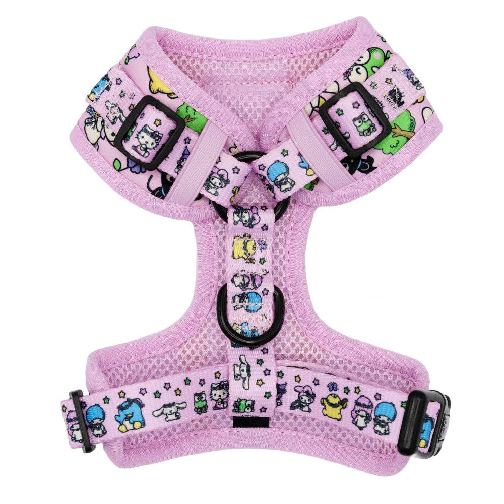 Pink dog harness with cartoon character pattern on a white background