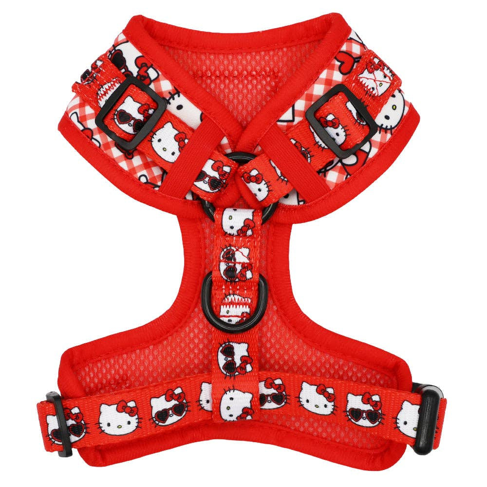 Red dog harness with Hello Kitty pattern on a white background