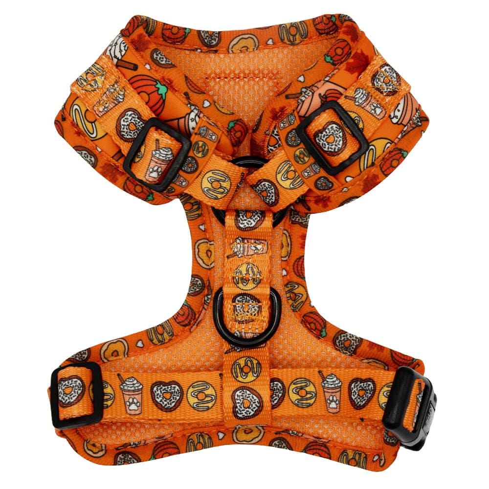 Orange dog harness with Halloween-themed pattern on a white background