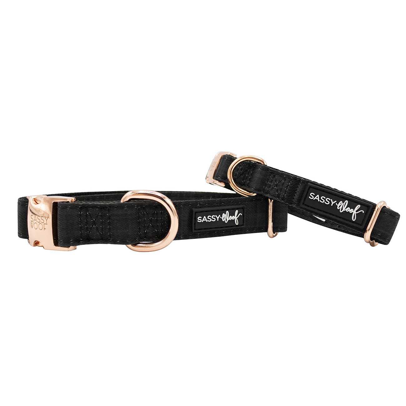 Two black dog collars with gold hardware on a white background, branded 'Sassy & Wolf'.