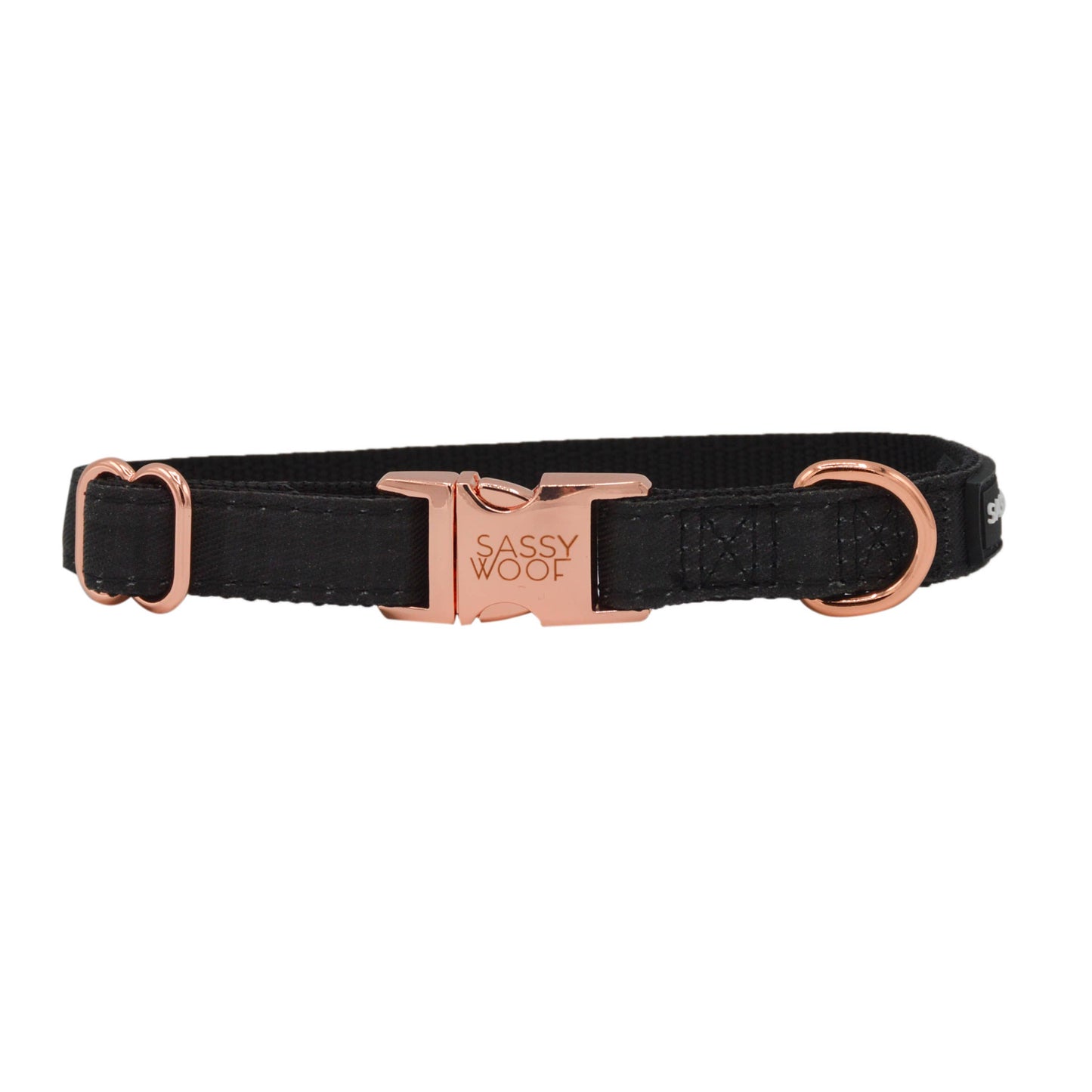 Black dog collar with rose gold buckle on a white background