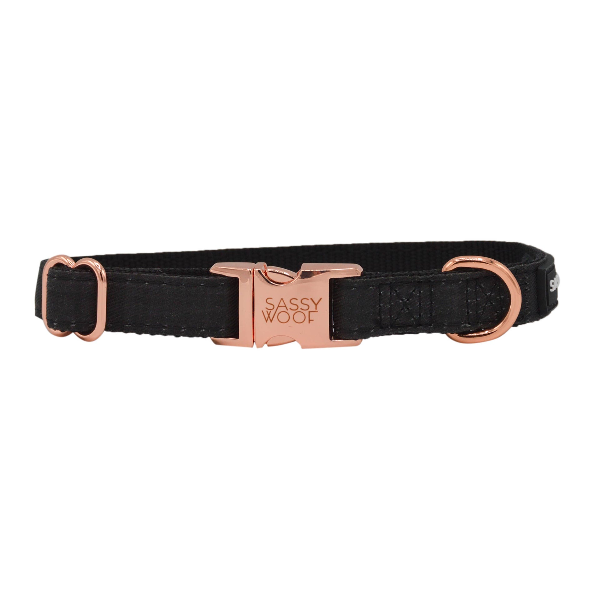 Black dog collar with rose gold buckle on a white background