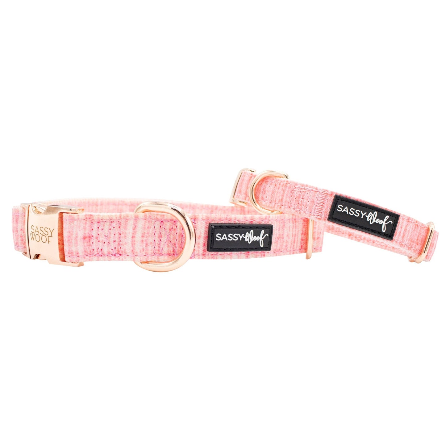 Pink dog collar with gold hardware and 'Sassy & Meow' label on a white background
