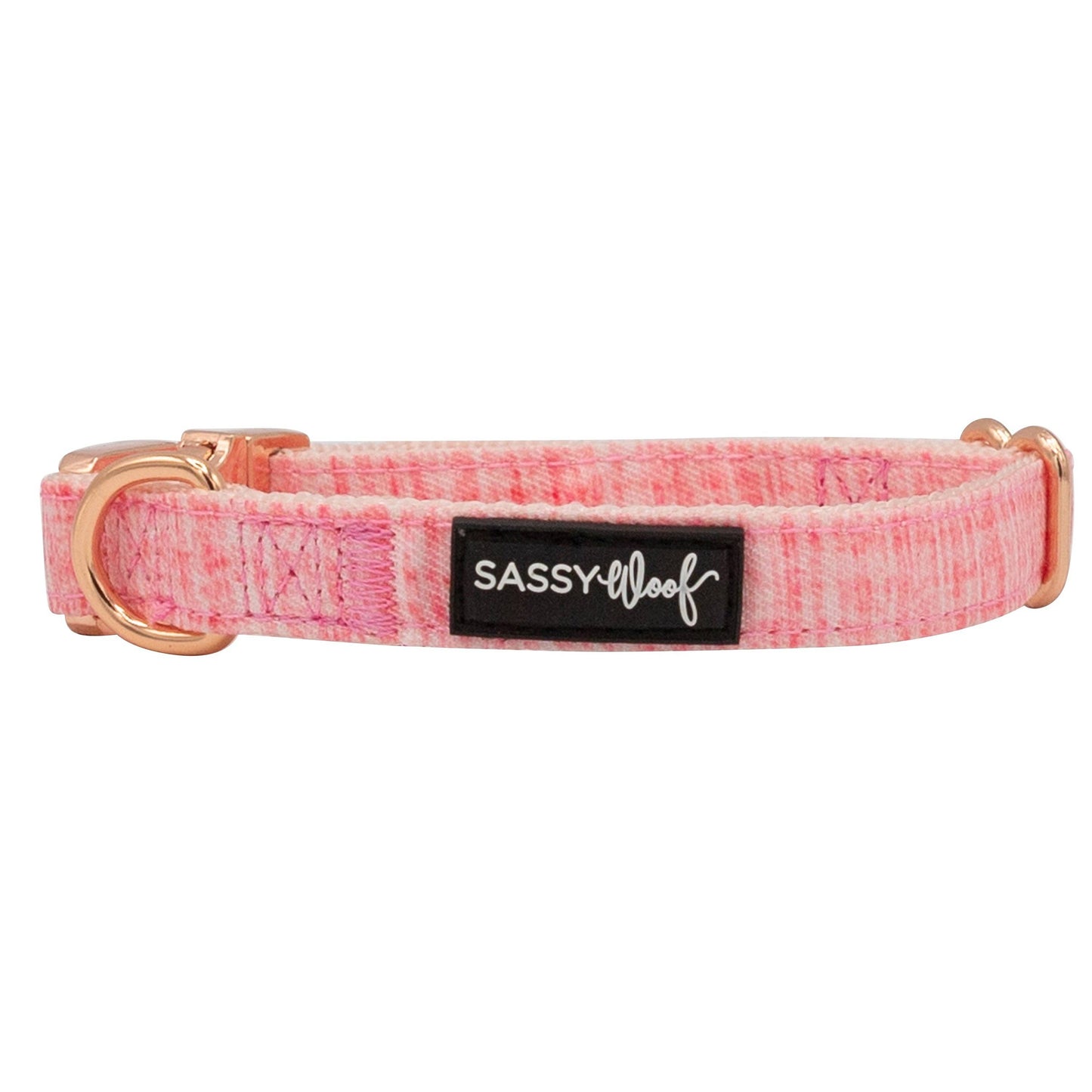 Pink dog collar with a gold buckle and 'Sassy Loof' label on a white background