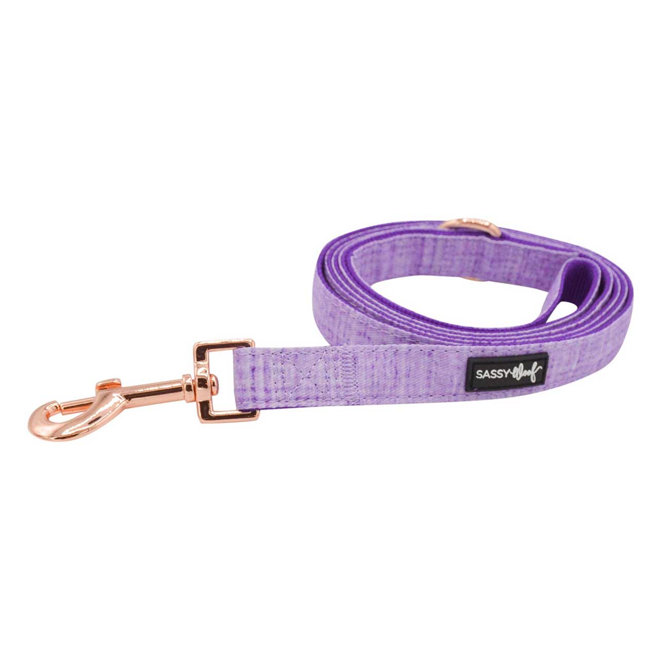 Purple dog leash with rose gold clip on a white background