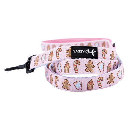 Dog leash with gingerbread design and 'Sassy Leash' label on a white background