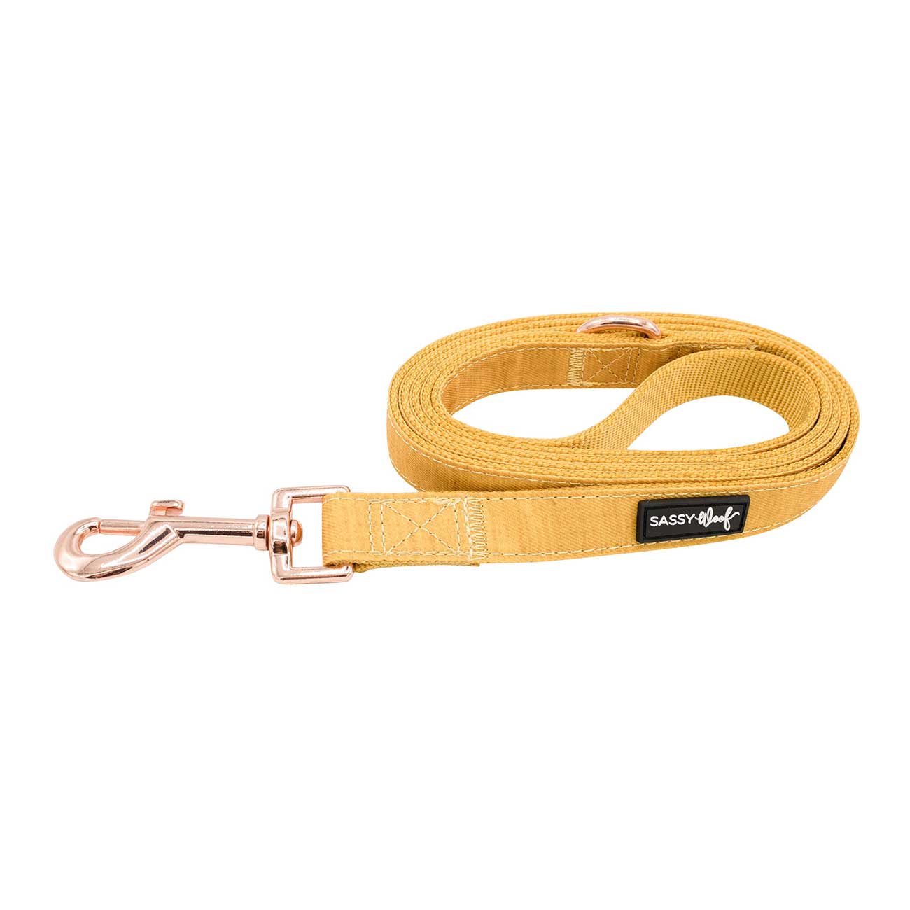Yellow dog leash with rose gold clip and 'Sassy & Co.' label on a white background