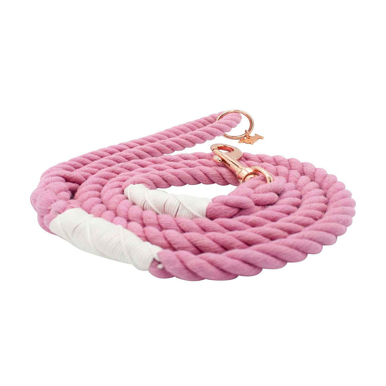 Pink and white dog leash with a rose gold clip on a white background