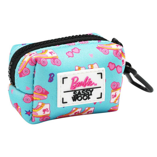 Small blue dog waste bag holder with rollerskates-themed design and Barbie branding on a white background