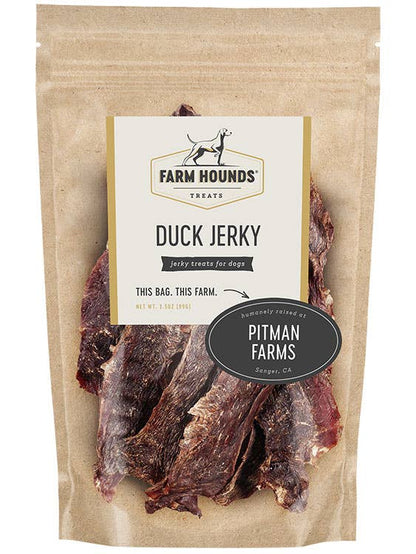 Package of Farm Hounds Duck Jerky for dogs with visible branding.