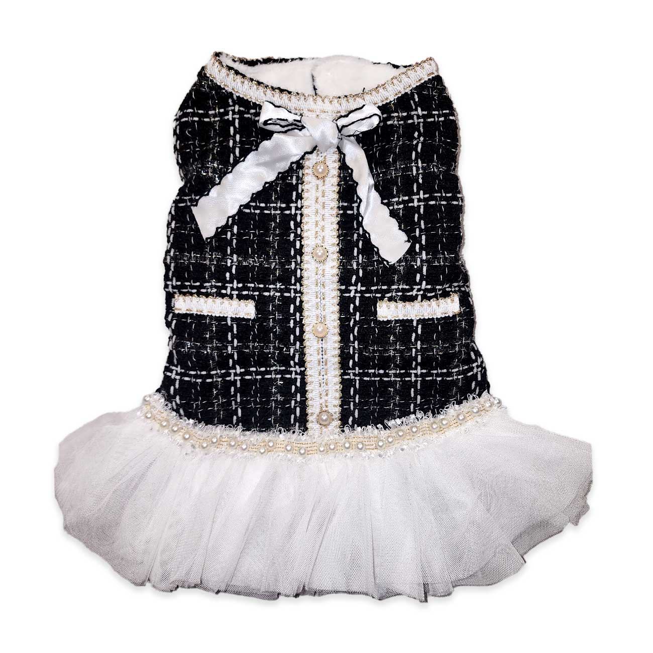 Dog dress with black tweed pattern, white bow, and skirt on a white background