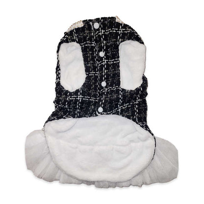 Dog coat with plaid pattern and white fur on a white background