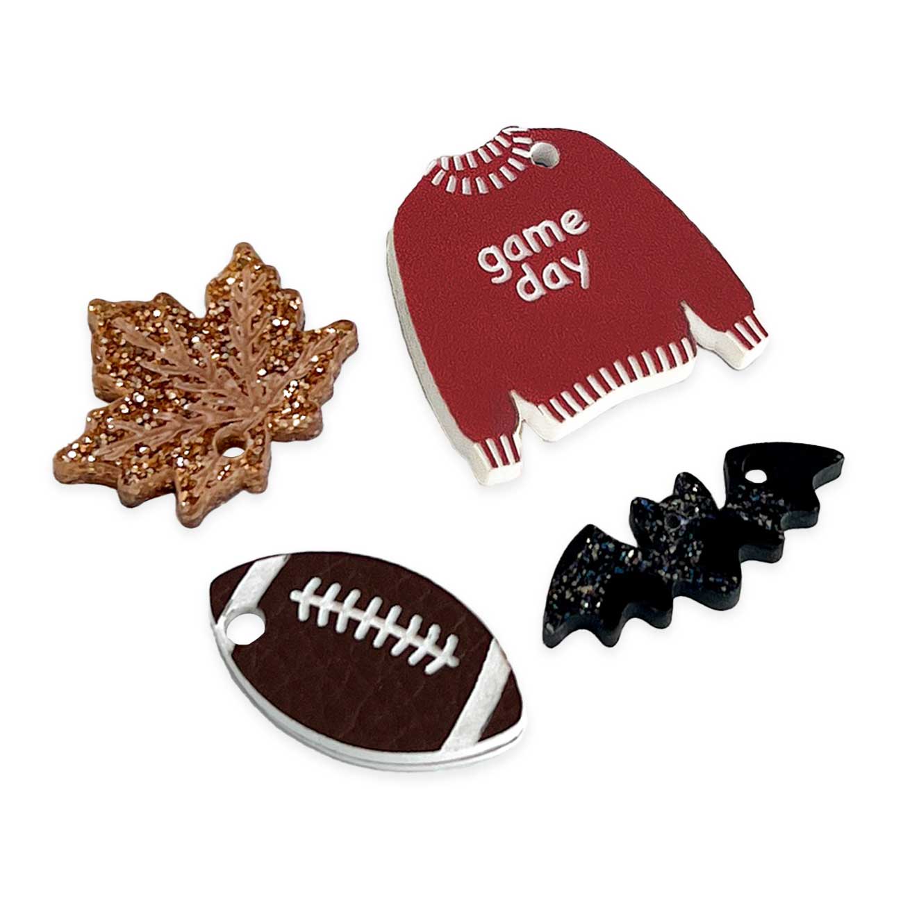 Four decorative pet tags on a white background