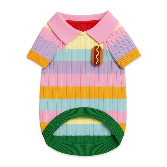 Colorful striped dog sweater with a hot dog button on a white background