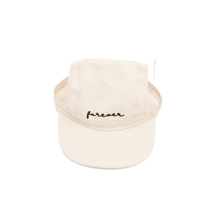 Beige visor with 'furever' text on a white background