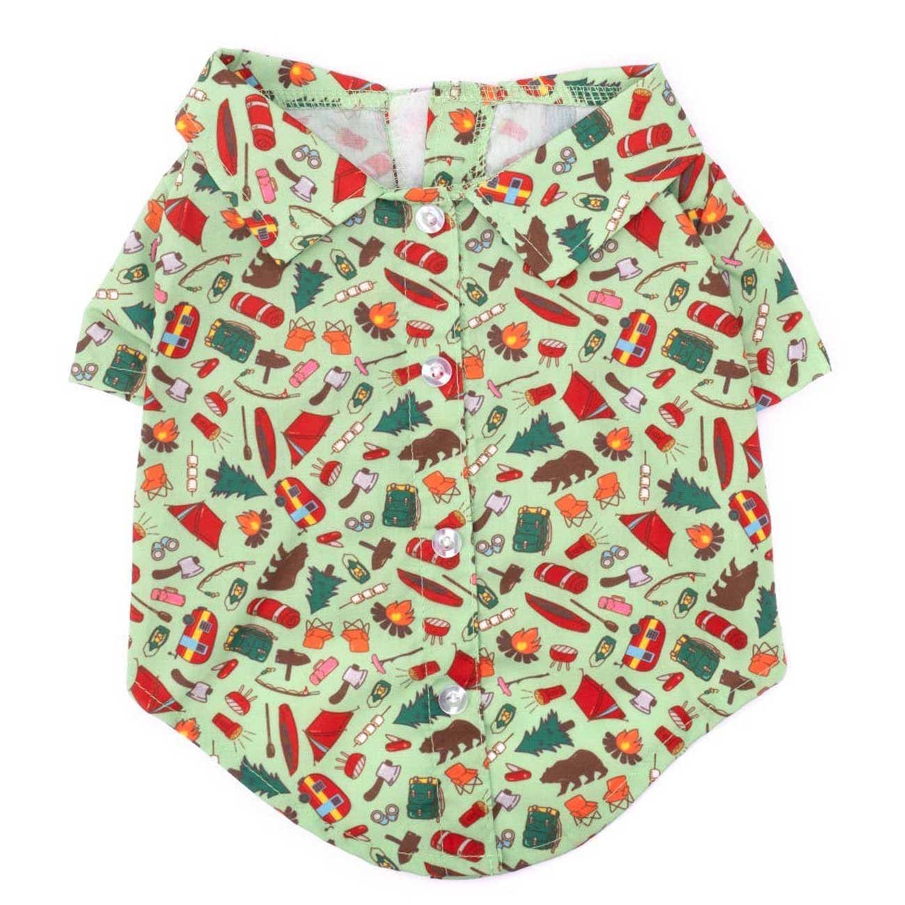 Dog shirt with camping-themed pattern on a light green background