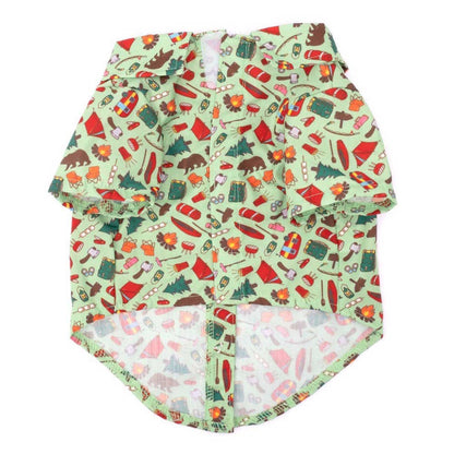 Dog shirt with nature-themed pattern on a white background