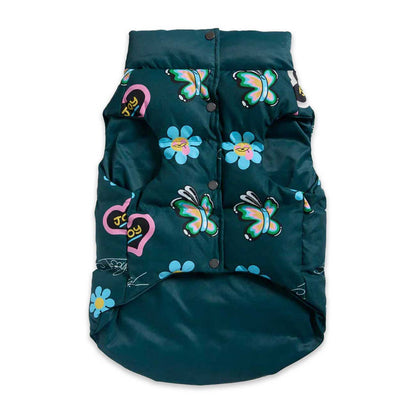Dark green puffer dog vest with colorful butterfly and flower patterns on a white background