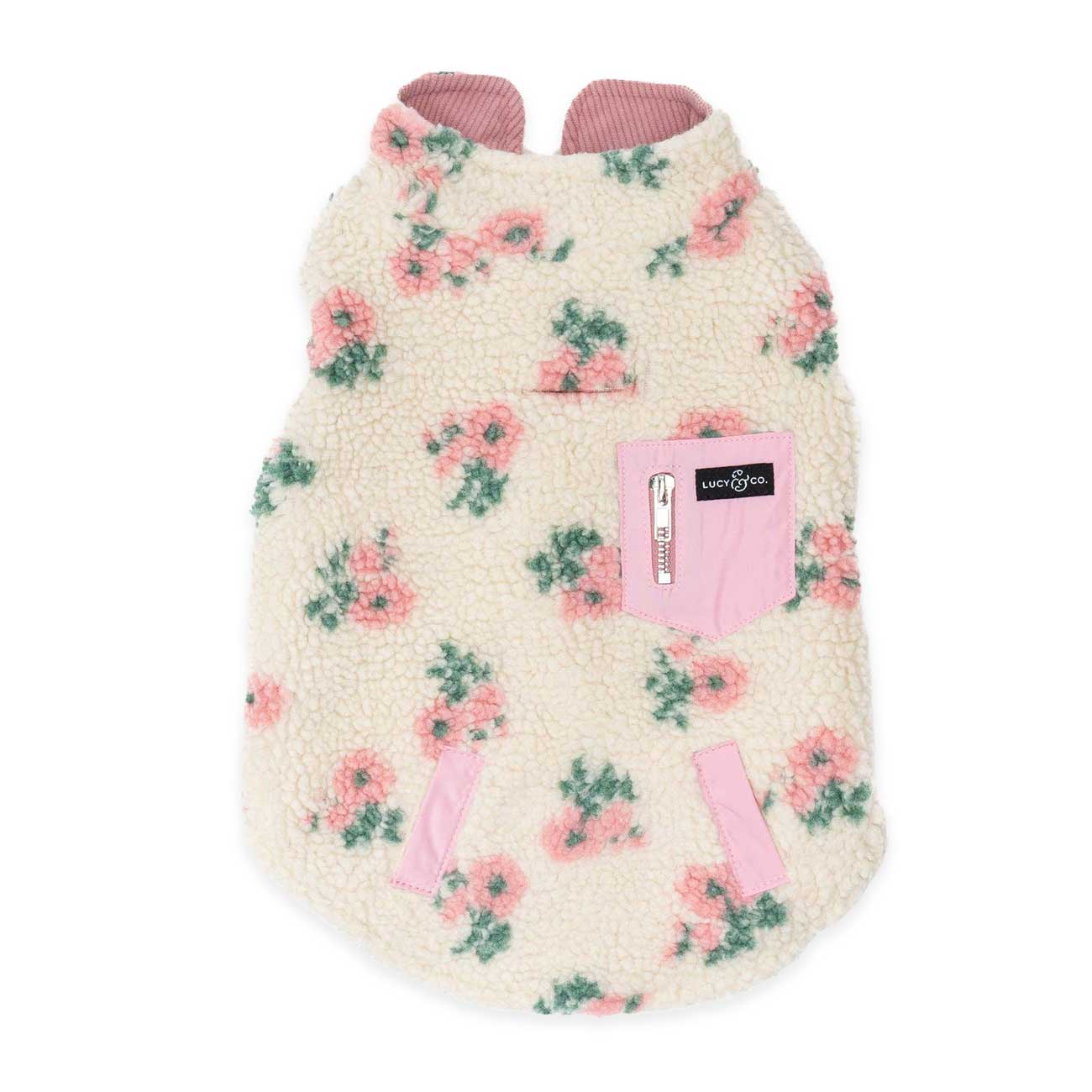 Floral patterned dog coat with a pink pocket on a white background