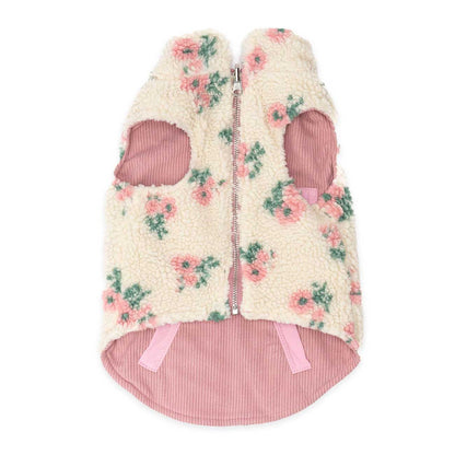 Floral patterned pet coat with pink interior on a white background