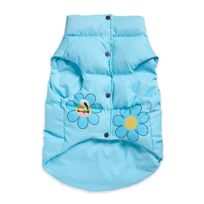 Light blue puffer dog vest with floral designs on a white background