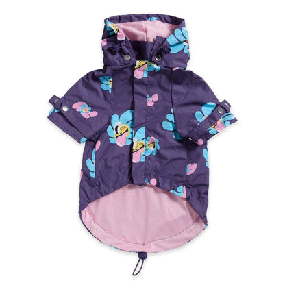 Dog's purple raincoat with colorful floral patterns on a white background