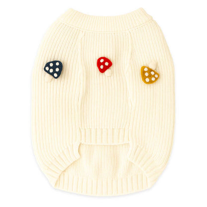 Cream-colored sweater with colorful 3D icons on a white background