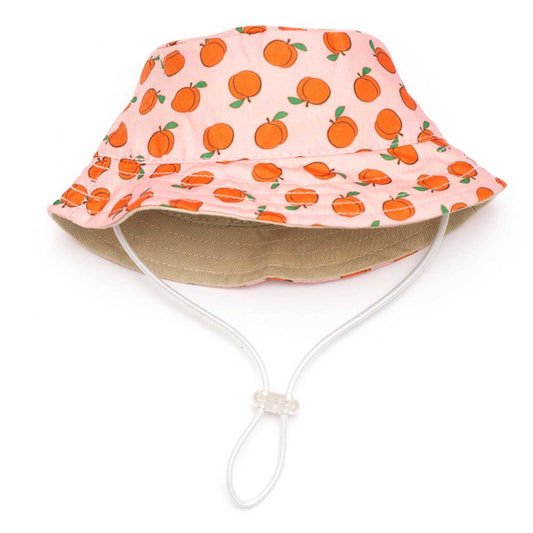 Pink bucket hat with orange peach pattern on a white background