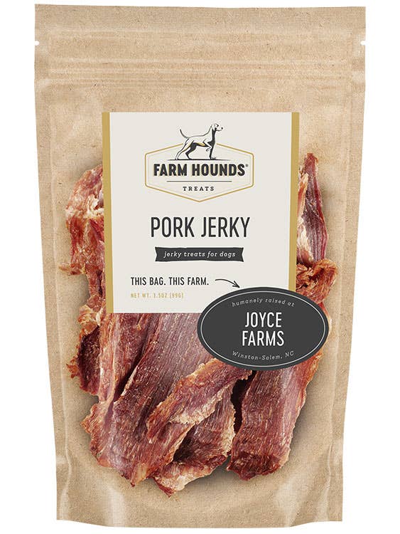 Package of Farm Hounds Pork Jerky for dogs with visible branding on a white background