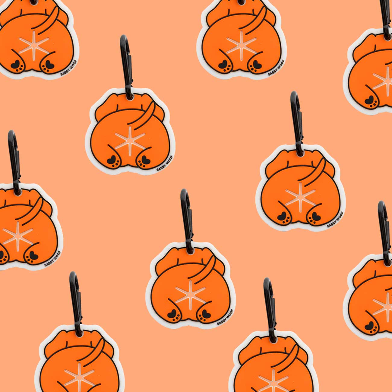 Pattern of orange dog shaped dog waste bag holder on an orange background