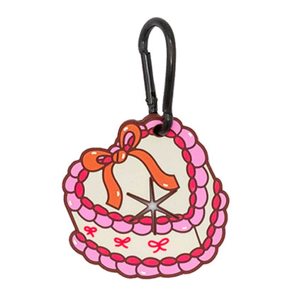 Dog waste bag holder with heart shaped cake and pink ribbons on a white background