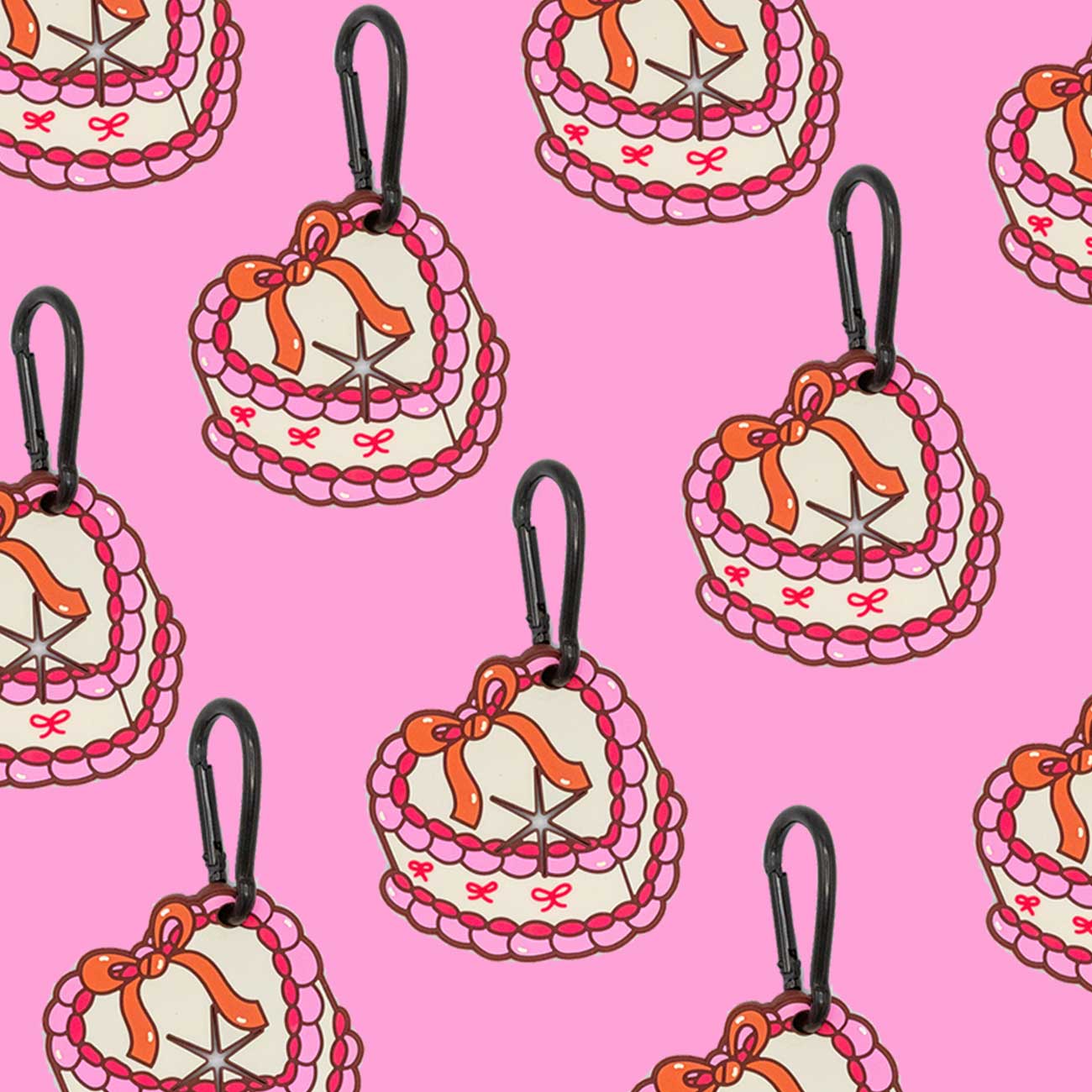 Heart-shaped dog waste bag holders with bows on a pink background