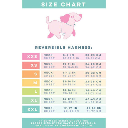 Size chart for reversible dog harnesses with a pink dog illustration at the top.