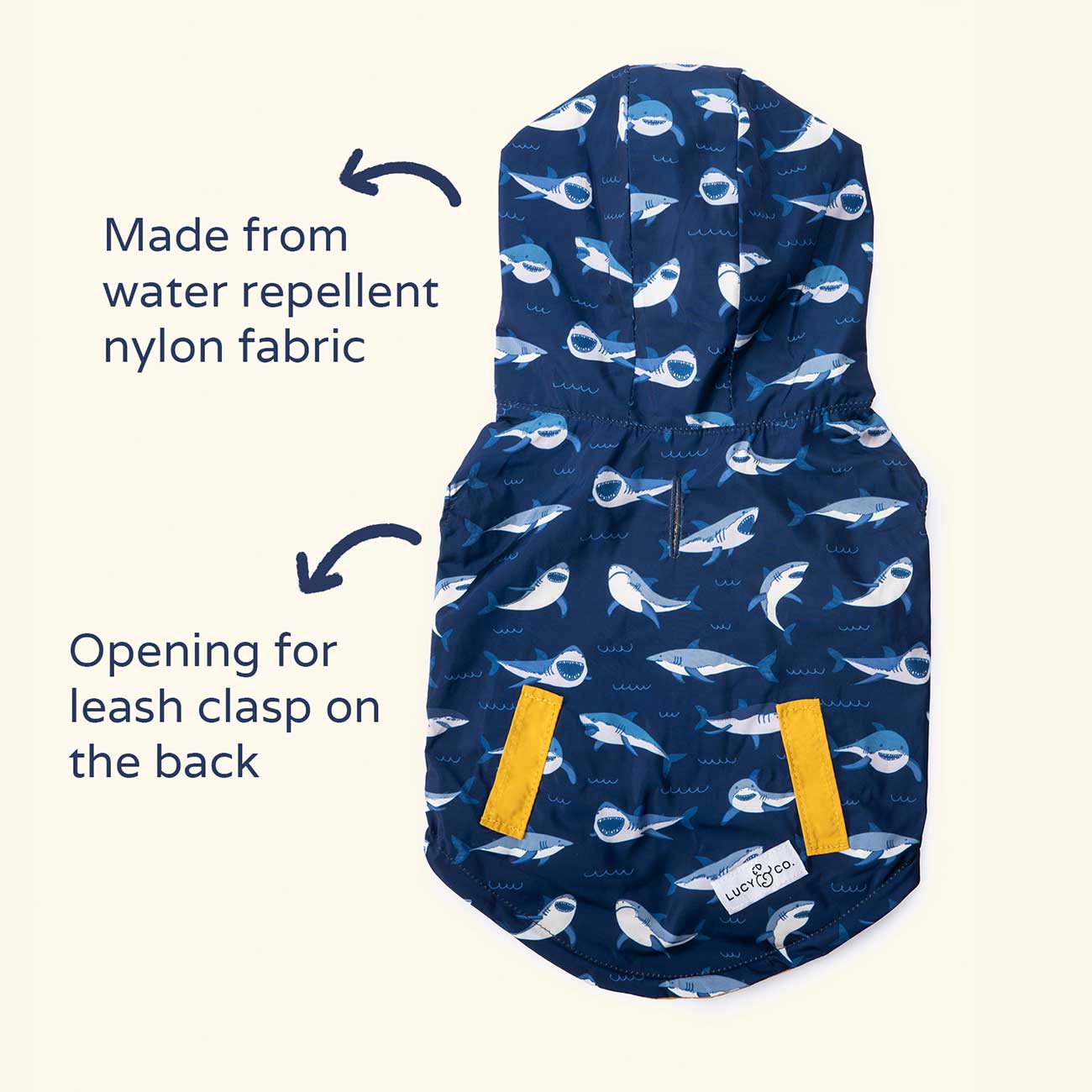 Dog raincoat with whale pattern on a white background