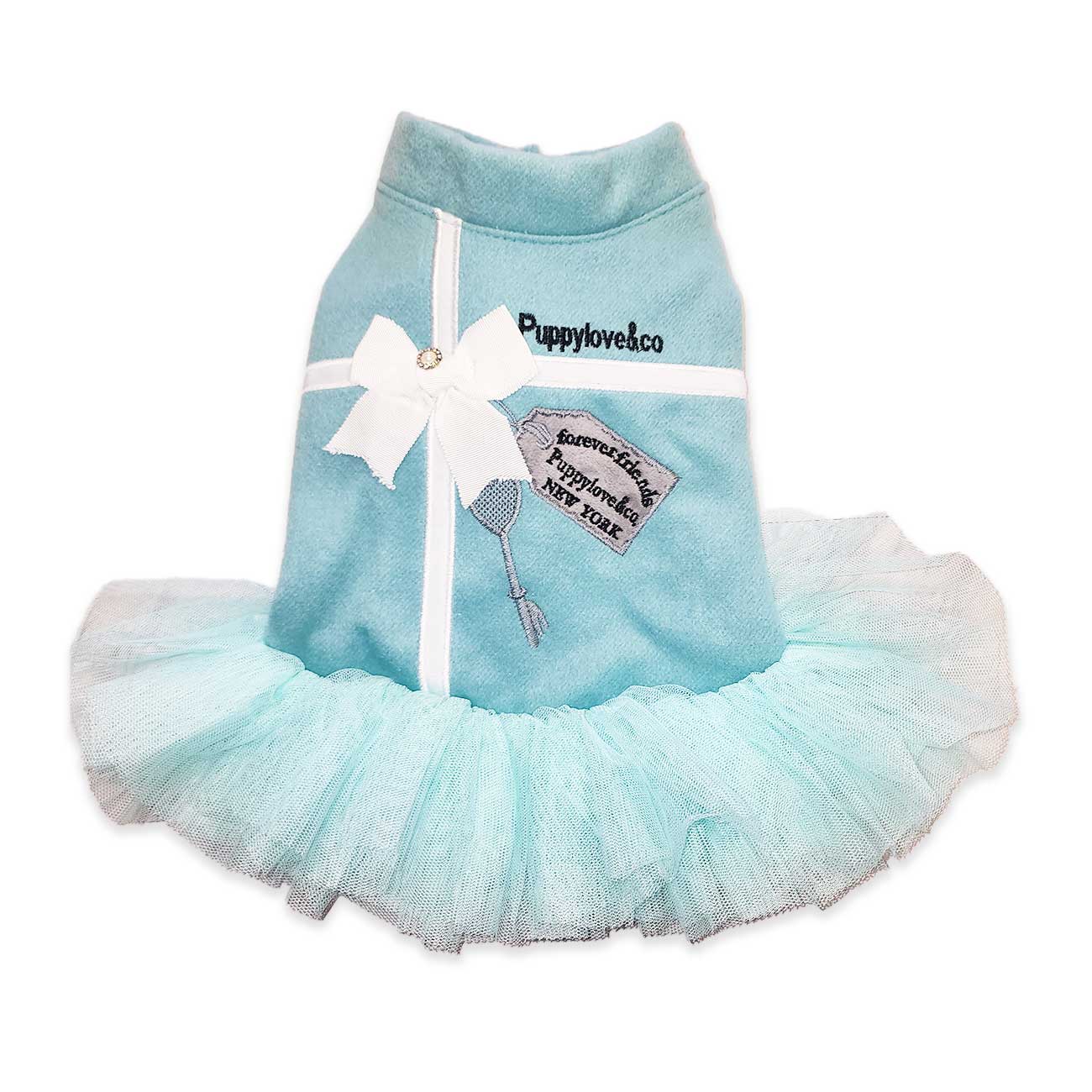 Light blue pet dress with a white bow and 'Puppylovesco' branding on a white background