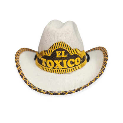 White cowboy dog hat with a yellow and black 'El Toxico' band on a white background