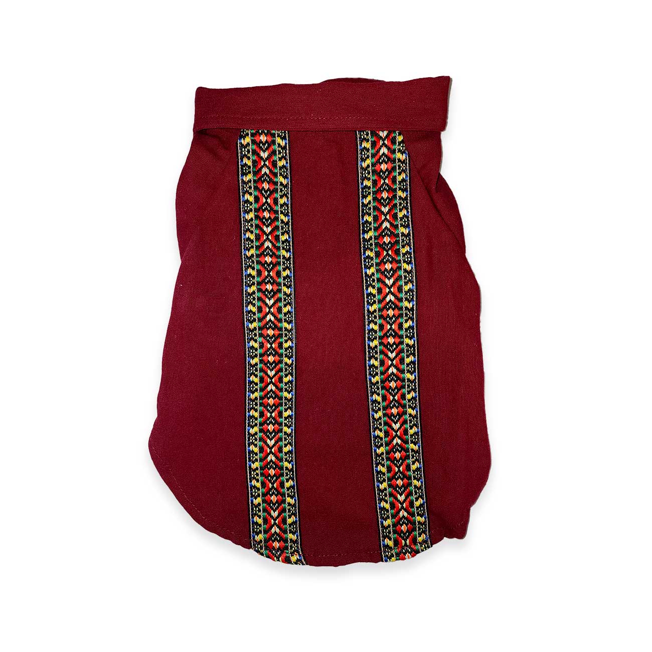 Maroon dog shirt with colorful geometric patterns on a white background