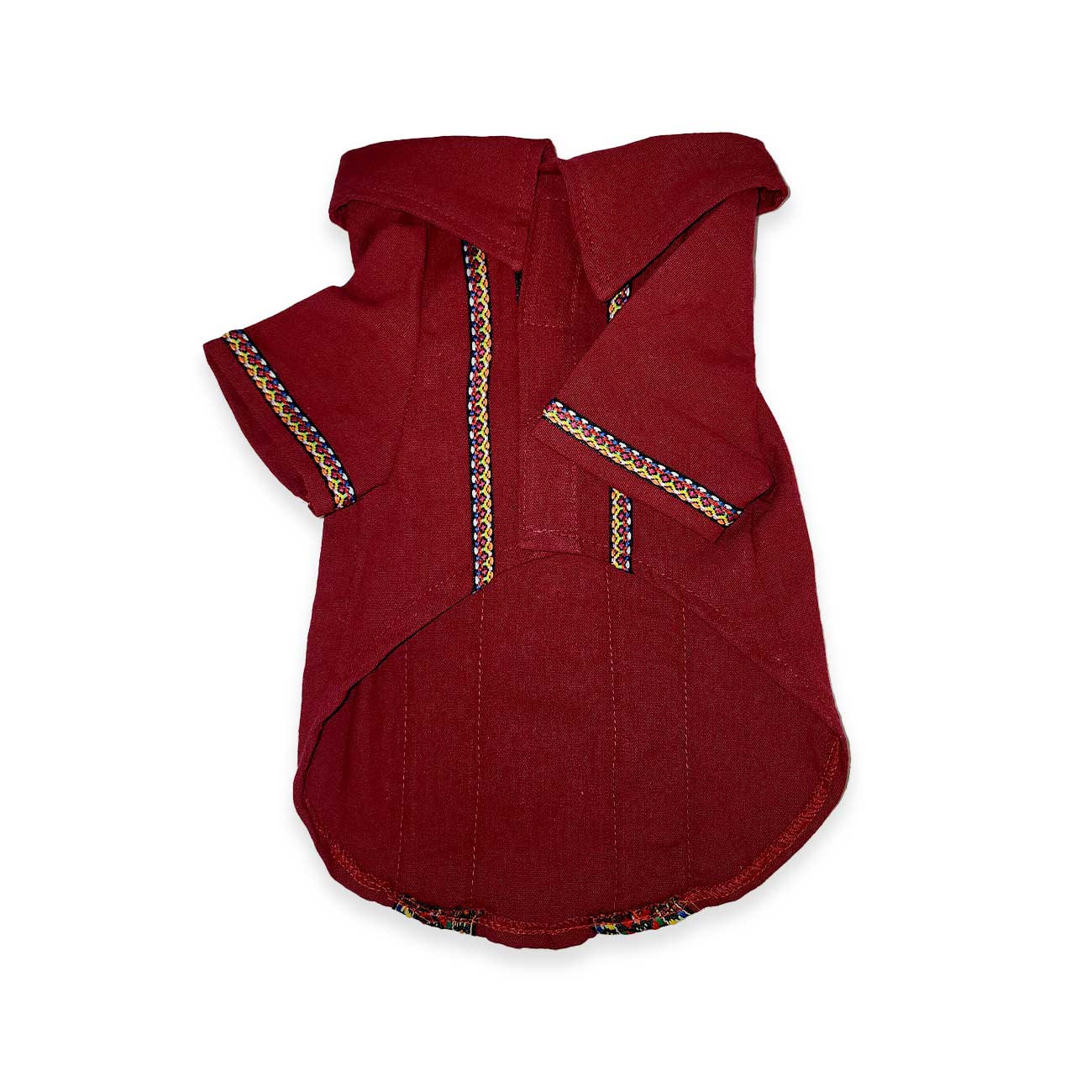 Burgundy dog dress with gold trim on a white background