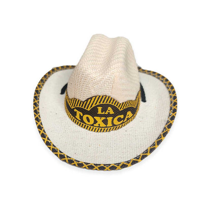Cowboy dog hat with 'La Toxica' band on a white background