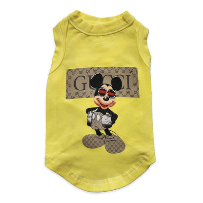 Yellow pet t shirt with a cartoon character and 'GUCCI' logo on a white background