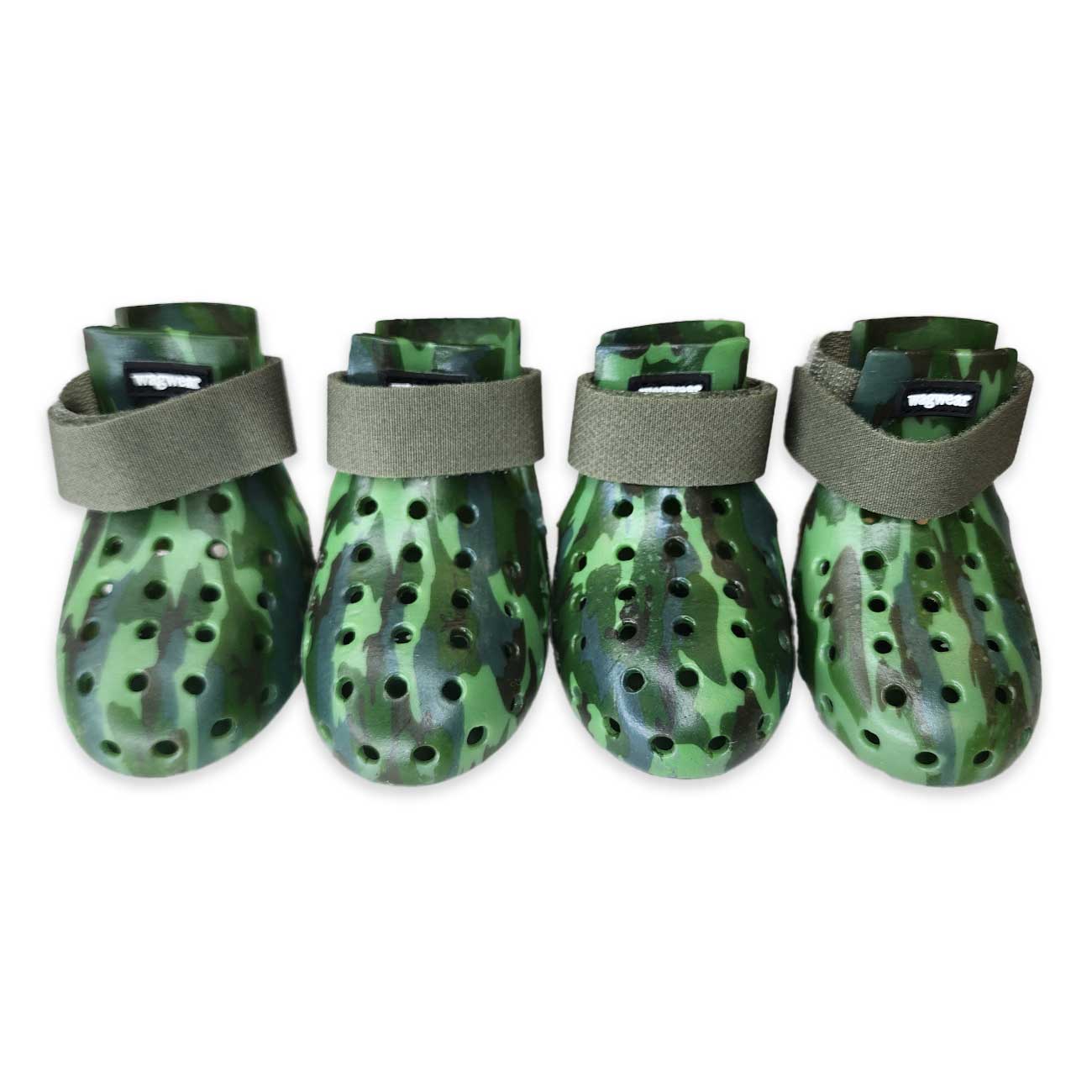 Four green camouflage dog boots with gray straps on a white background